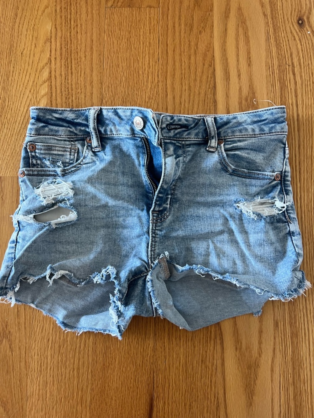 American Eagle Women’s Light Blue Distressed Denim Shorts- size 0. Like new!